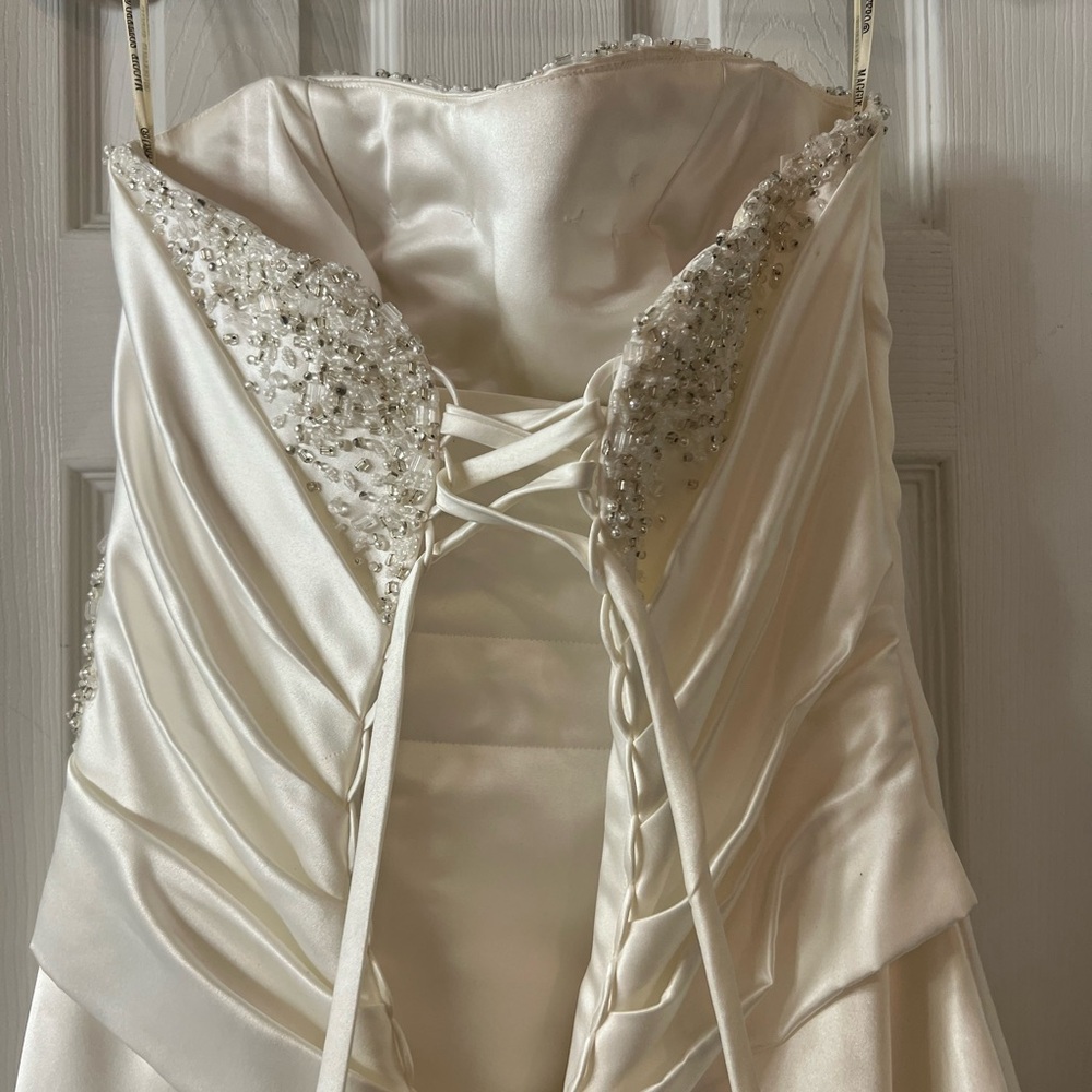 Maggie Sottero Elegant Strapless Wedding Gown - Picture 3 of 8